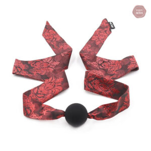 Accessoire BDSM : Bâillon boule avec détails en dentelle