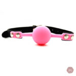 Bâillon boule rose pour des jeux de soumission