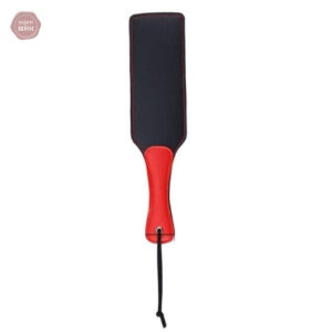 Paddle BDSM rouge avec manche ergonomique pour des jeux intenses