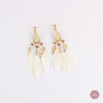 Élégance bohème, boucles d'oreilles en clip plume