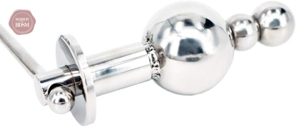 Cage pénienne avec système de fixation anal