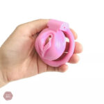 Cage de chasteté rose pour jeux intimes