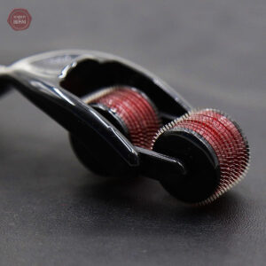 Accessoire de domination avec rouleaux à piquants