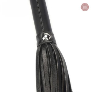 Fouet noir pour jeux de domination