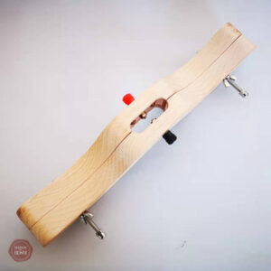 Accessoire BDSM en bois pour immobiliser les testicules