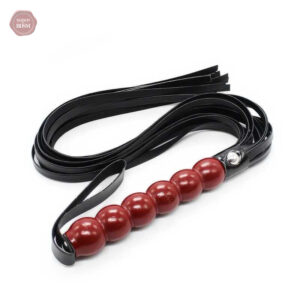 Fouet avec perles, accessoire pour BDSM et domination