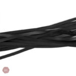 Fouet en cuir orné de strass, idéal pour les pratiques BDSM