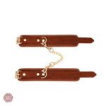 Menottes en cuir pour bondage et jeux érotiques