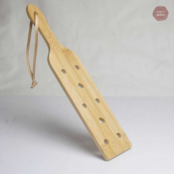 Outil de BDSM en bois, parfait pour des séances de jeu érotiques