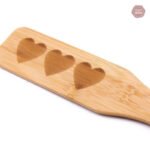 Paddle coquin en bois pour des sessions ludiques