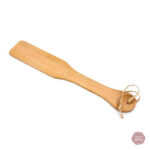 Accessoire BDSM en bois pour explorer les limites