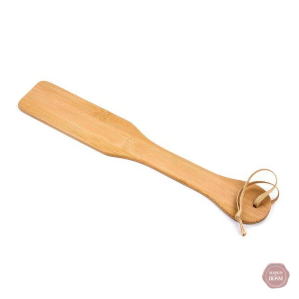 Accessoire BDSM en bois pour explorer les limites