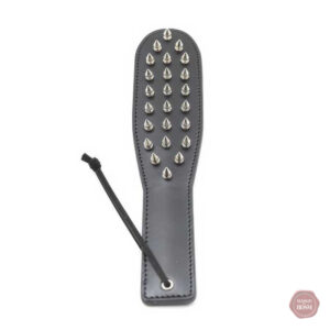 Accessoire BDSM en cuir avec clous pour stimulation sensorielle