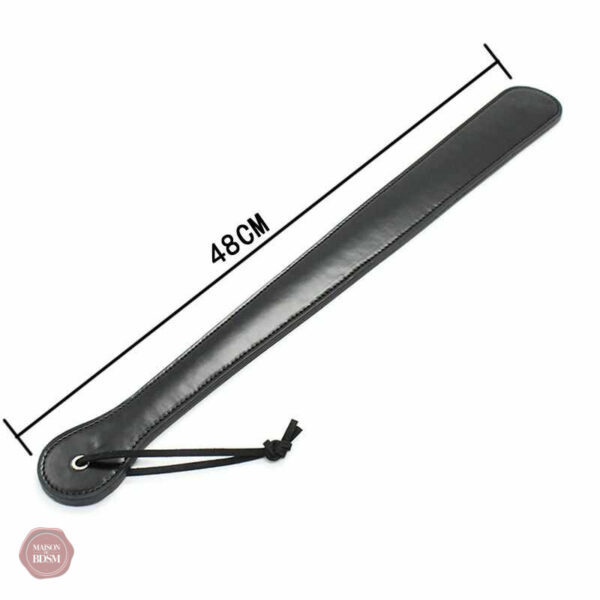 Paddle en cuir, instrument de plaisir et de contrôle