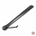 Paddle pour pratiques BDSM, design élégant et fonctionnel