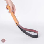 Paddle en cuir avec finition ombrée pour jeux de domination