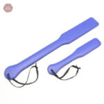 Paddle BDSM violet en simili cuir pour des jeux intenses