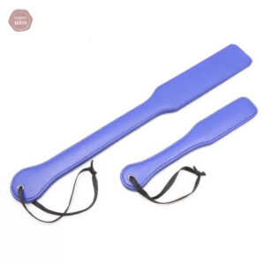 Paddle BDSM violet en simili cuir pour des jeux intenses
