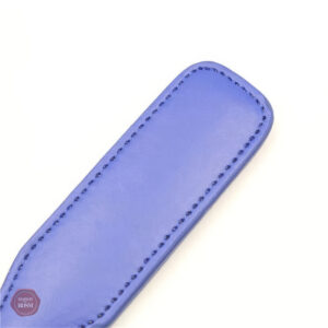 Outil de jeu BDSM en violet pour des sensations variées
