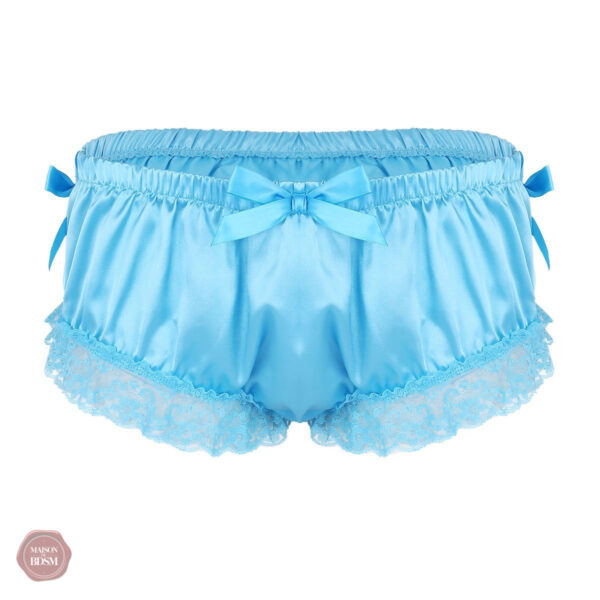 Vêtements travestis : slip délicat en dentelle et nœud